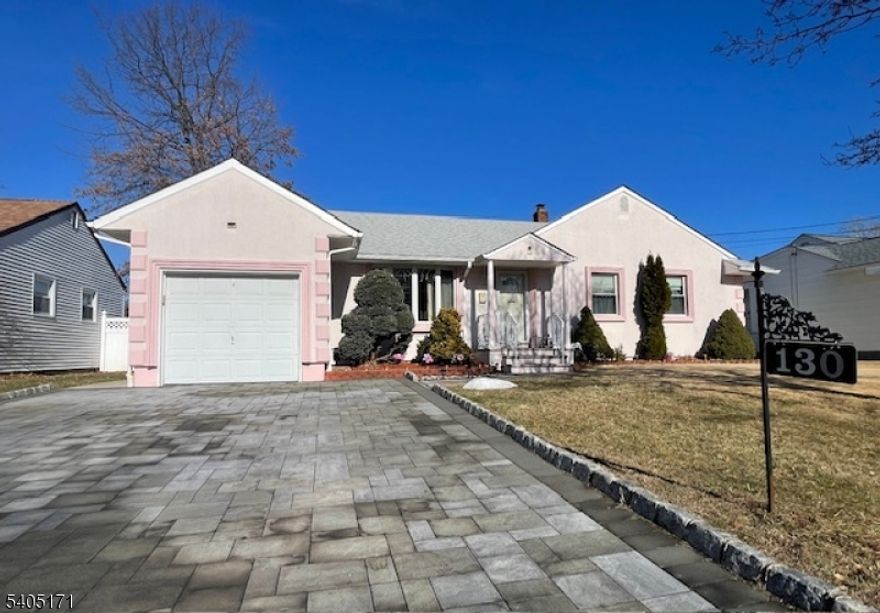 This impeccable ranch style/one floor living space with a large, updated finished basement is located in a quiet street yet near shopping, public transportation and major highways.  The first floor consists of three bedrooms, living room, dining room, kitchen, family room with sliding doors to a fenced in backyard, a full bath and a half bath.  The basement consists of a modern summer kitchen, large open space excellent for entertaining, a very spacious full bath, laundry and lots of storage.  There is central air for your comfort, a one car garage and driveway space for two more vehicles.  Your buyers are going to love this home.  Easy to show and move right in.