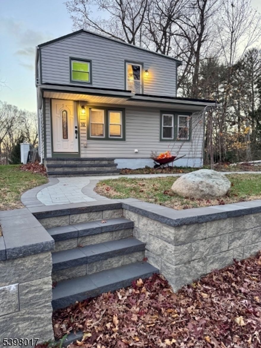 Step into this beautifully renovated 2-bedroom, 2-bath home in the heart of Budd Lake where modern comfort meets exceptional convenience. Every detail has been thoughtfully updated, beginning with the inviting front entrance featuring brand-new retaining walls and crisp, clean pathways. Inside, stunning wood floors flow throughout, creating a warm, seamless feel from room to room.The fully refreshed kitchen and baths offer a contemporary look and dependable function, while all-new mechanicals ensure true peace of mind. Whether you're relaxing in the bright living spaces or hosting in the move-in-ready layout, this home combines style with easy everyday living.Outside, paver steps guide you to a beautifully crafted paver patio perfect for morning coffee, evening conversations, or weekend gatherings. The yard is designed for low maintenance and high enjoyment.Located minutes from commuter routes, shopping, dining, and Budd Lake's natural beauty, this home delivers both comfort and convenience. A rare opportunity to enjoy turnkey living in a prime location.