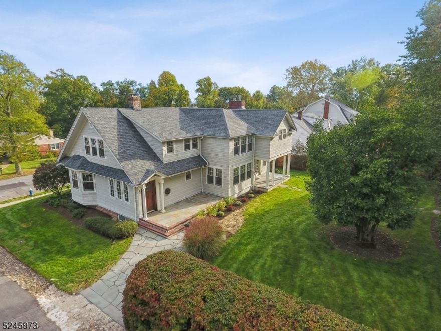 You'll find the perfect balance of modern and traditional style in this upscale yet casual 5 bedroom Hamptons-style Colonial in the heart of Wyoming. As you enter into this wonderful home, you'll be greeted with a bright and naturally lit open floorplan. On the main level, you will find plenty of space to relax and unwind with a living room, formal dining room, large family room, office area, and a wonderfully equipped kitchen with a breakfast area. The kitchen features full stainless steel appliances such as a Wolf 6 burner dual fuel range, a Samsung refrigerator, Miele dishwasher, microwave oven, and a pot filler. The main level is rounded off with 2 fireplaces, large windows, recessed lights, and hardwood floors throughout. On the second floor, you will find 5 bedrooms with plenty of closets and storage space. The Primary Bedroom features an en-suite bathroom with two walk-in closets and a fireplace. The finished basement gives you even more practicality and storage featuring a laundry room with LG washer/dryers, an exercise room, rec room, wine room, full bathroom, and a massive storage/utility room. For additional storage, ther is a walk-up attic and an oversized detached two car garage. Enjoy tons of outdoor space for further relaxation either on the patio or in the massive yard. The prime location of this home puts you within moments of Maplewood Village and Downtown Millburn while also having access to transportation, schools, and things to do. 42 Cedar awaits you..