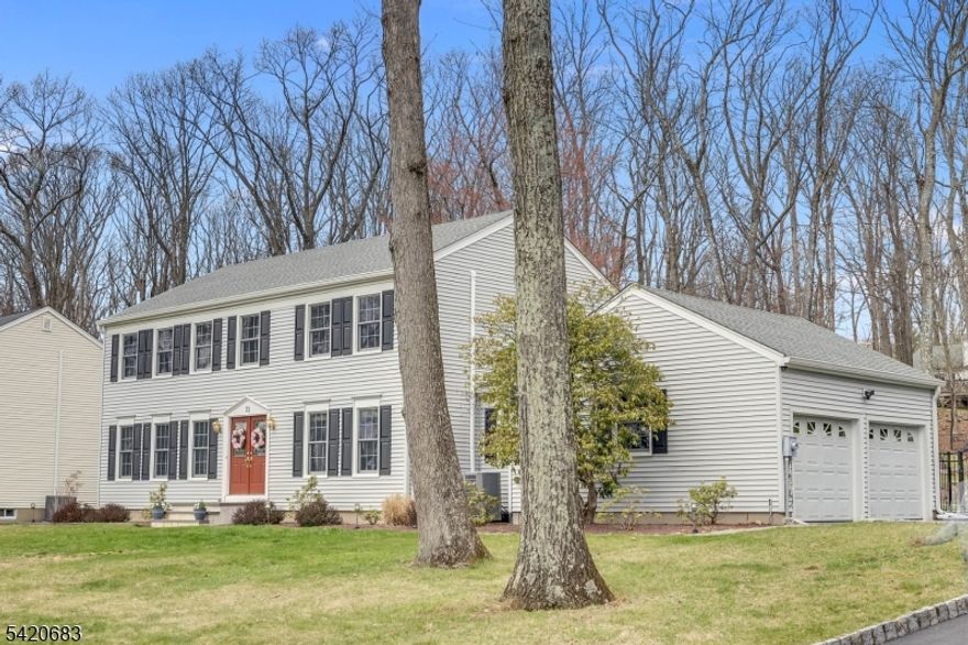 Welcome to this pristine home in the highly sought-after Nestling Wood section of Long Valley. This beautifully maintained rare extended model offers exceptional space and versatility.  The updated eat-in kitchen features stainless steel appliances, granite countertops, tile backsplash, and a pantry. Formal living and dining rooms, along with the inviting family room, showcase hardwood floors, a wood-burning fireplace, and custom built-ins. Upstairs offers custom wool carpeting, a spacious primary suite with a walk-in closet and updated en-suite bath, plus three additional generously sized bedrooms and an updated full guest bath. The finished basement provides additional living space ideal for a recreation room, home office, or gym. Step outside to your private backyard oasis featuring a stunning in-ground pool, outdoor bar, impressive rock wall, and beautifully landscaped grounds with lighting perfect for entertaining or relaxing. Roof equipped with heat cables.