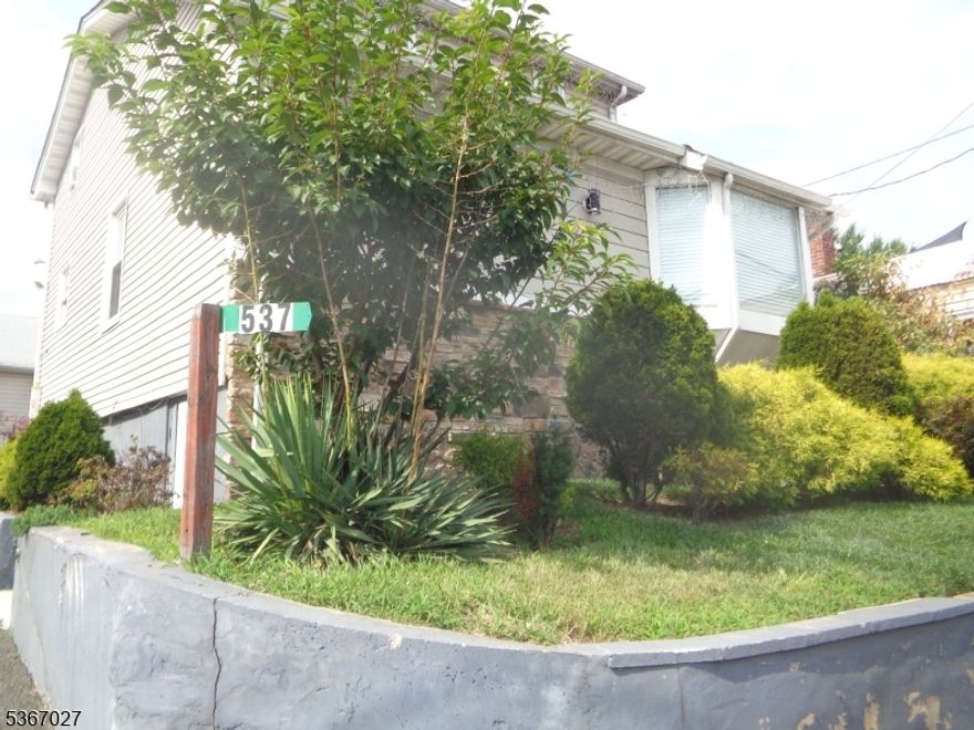 Subject consists of 527 and 537 Rt 22, westbound direction. Lot 26 is #527, a one family house with blue siding, lot size 37 x 100 approx. There are 4 bedrooms, living room, dining room, kitchen and 4 full baths. There are two garages behind the house. Lot 29.01 is 537 Rt 22 and 535 Rt 22 (no highway frontage) and consists of 3 separate buildings. The main building is a one family house that has recently been nicely renovated with 4 bedrooms, 4 full baths and finished basement. Attached is a Florida room with brick bbq, bar, refrigerator and grill and a recreation room with walkout to the deck and above ground pool and fenced play area. Behind #537 is a 2 bedroom ranch (535 Rt 22) with finished basement, full bath and coin op laundry machines, rented. The third building consists of a workshop and 2 garages attached.