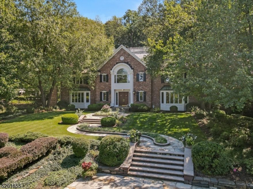 This exquisite custom brick residence is situated on 5 acres of picturesque land in Mendham Boro. This property boasts breathtaking views of the skyline and is a true oasis of luxury and comfort. This magnificent home spans approx. 11,000 SF including the lower level and features 8BR, 8.4 baths. The gourmet kitchen features a separate catering kitchen perfect for hosting events and parties. The primary suite is the epitome of relaxation and luxury. The lower level is a masterpiece of entertainment, with an English Pub, wine cellar, media room, billiards and  2 BR apartment. all designed to cater to your every need. The private courtyards offer a serene escape, and the front motor court with additional parking allows for space to accommodate guests. There is a 4 car garage with ample storage space and a generator. The slate roof with copper flashings adds to the durability of the home. The exterior property is professionally landscaped with mature plantings, perennials and  herb garden. The inground heated pool and pool house are perfect additions for summertime fun and a year round hot tub is the ultimate relaxation spot. The property  also features pergolas with fans and sweeping terraces, an outdoor kitchen with barbeque, refrigerator and sink allowing for effortless entertaining. This property enclosed with deer fencing adds to the privacy of this residence. This estate offers an unparalleled lifestyle of luxury, comfort and elegance.