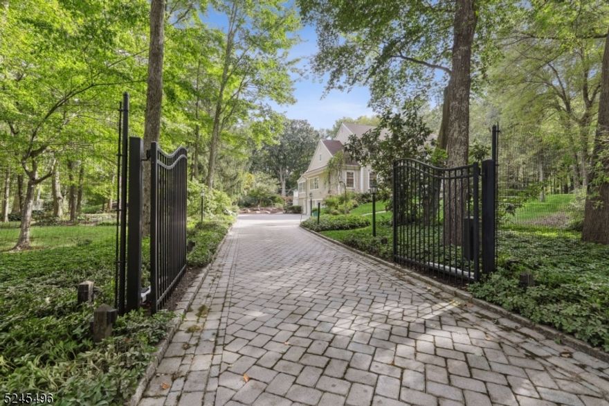 Location, location, location makes this the perfect home, tucked away on a quiet cul-de-sac, yet only minutes away from Chatham, Madison, Loantaka park, and the entertainment and restaurants of Morristown. The home sits majestically on a 3.26 acre lot, backing onto 20 acres of protected land, with a tennis ct, koi pond and center fountain. The outdoors flourish from spring to fall with an exquisite display of colorful, blooming perennials .This impeccably  maintained  8,000 sq ft + home has the colonial look and layout from the front and transforms into a custom home in the back with a large, heated indoor pool overlooking the lush grounds and double story atrium. The open plan kitchen is filled with natural light from its numerous tall windows. The kitchen's extra large center Island, sub zero refrigerator, tall upright freezer, walk- in pantry, two dishwashers, wine cooler, walk in pantry and all high end appliances, make this a "Chef's Dream Kitchen". A beautiful stone paved driveway and patio lead to the back of the property and to the upper level deck. Get blown away with the home's many extras which include, 3 gas fireplaces, wine cellar, home sound system, full home generator,   large 3 car garage, with an electric car charger, 2 en-suites, blue stone patio, one with a pergola, recently renovated bathrooms and updated white kitchen, 40 year roof replaced 20 years ago, 2 sets of W/D, sprinkler system and a beautiful custom fitted walk-in master bedroom closet. .