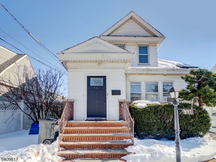 Versatile 2-family in a premier residential zone, perfect for commuters & investors. Unit 1: 1st Floor, Features spacious 3BR/1BA with an oversized living room. 2nd Floor Unit 2: Fully renovated 2BR/1BA featuring modern finishes & move-in ready appeal. Bonus Space: Fully finished basement includes a wet-bar, 1 Full bath, and 2 versatile bonus rooms. The exterior of the home has a private backyard, large driveway & a detached 2-car garage with ample storage space. This is a prime location with immediate access to major highways (GSP/I-78) & public transit. Turnkey opportunity for owner-occupant or high-yield investment! The 2nd floor lease expires in May and the 1st floor is month to month. Client leases solar panels for approximately $60/per month.