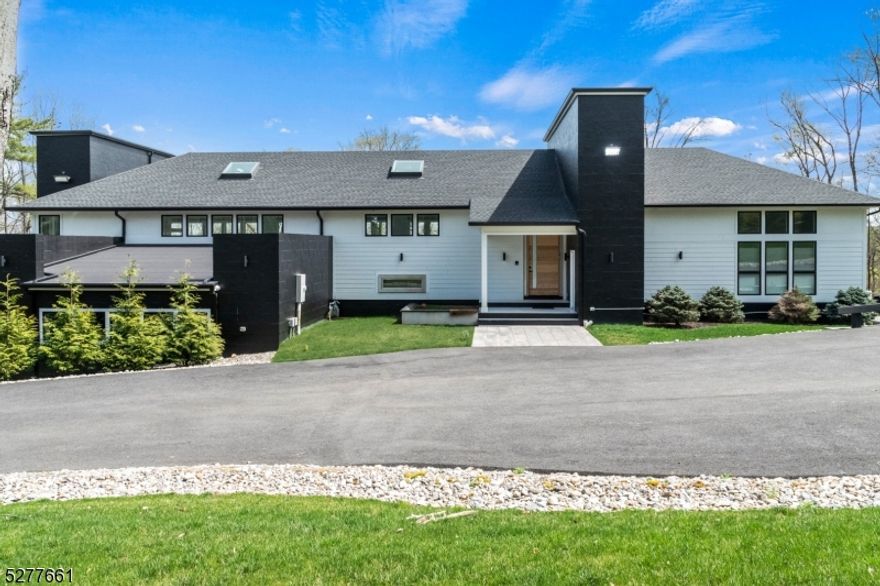 Escape the hustle and bustle of New York City and find your perfect oasis at 15 Birch Road in Kinnelon, NJ. This custom-built home offers luxury, privacy, and convenience, all within an hour?s drive of the city. The exterior of the home spans 3 acres and features an inground heated pool, a pool cabana with 1 bedroom and 1 bath, a shed with a 1-car parking and finished 2nd-floor studio, and an 850SF heated driveway. The home also comes with a built-in 48k generator with gas operated automatic switch, ensuring your comfort even during power outages. Inside, the home features 4 bedrooms and 6.1 bathrooms with 12-foot ceilings and spacious interiors. The Scavolini kitchen comes complete with a Caesarstone countertop, Caesarstone island, Corian backsplash, Thermador appliances, and Frigidaire professional refrigerator, while the walk-in pantry provides ample storage space. The home also features 2 gas fireplaces, radiant heat, and a full-sized gym ensuring that every aspect of the home is designed to perfection. The home also has a steam room and sauna ready, making it the ultimate space for relaxation and rejuvenation. The property is conveniently located within an hour of New York City, 30 minutes to Crystal Springs Resort, Mountain Creek, Grand Cascades Lodge, and 40 minutes to Warwick Valley Winery. This makes it the perfect location for anyone who wants to escape the city while still having access to all of the amenities and attractions it has to offer.