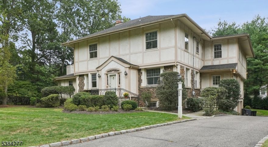 Be prepared to fall in love with this grand 5 bedroom Colonial, set on .42 acres of lush property in the heart of Short Hills, just blocks to town, top schools & train stations. Ideal floor plan with massive formal living room with fireplace, dining room with fireplace, gourmet eat-in kitchen with natural stone countertops and top of the line stainless steel appliances open to family room with high ceilings & fireplace, pair of French doors open to a spacious deck overlooking the beautiful totally level property. There is a 1st level great room / home office with fireplace & built-in bookcases. Formal entrance hall & beautiful powder room & laundry room complete the 1st level. The 2nd level has a luxurious Primary Suite with walk-in custom closet, + 2 additional walk-in closets & spa-like bath with great natural light, a jetted tub & large glass enclosed shower. 4 more large bedrooms, 2 of which have en suite full baths, and an additional hall bath complete the 2nd level. Beautifully finished lower level with recreation room, wine cellar, office, powder room, mudroom & access to 2-car garage. Ideal location on a prestigious quiet street walking distance to the Short Hills Train Station (just .7 miles). Bus service to highly rated Hartshorn Elementary school (#3 in New Jersey), as well Washington School, Millburn Middle & High School. This great Short Hills home is the dream home you've been waiting for. An architect has confirmed there is plenty of room for a pool. Low taxes!