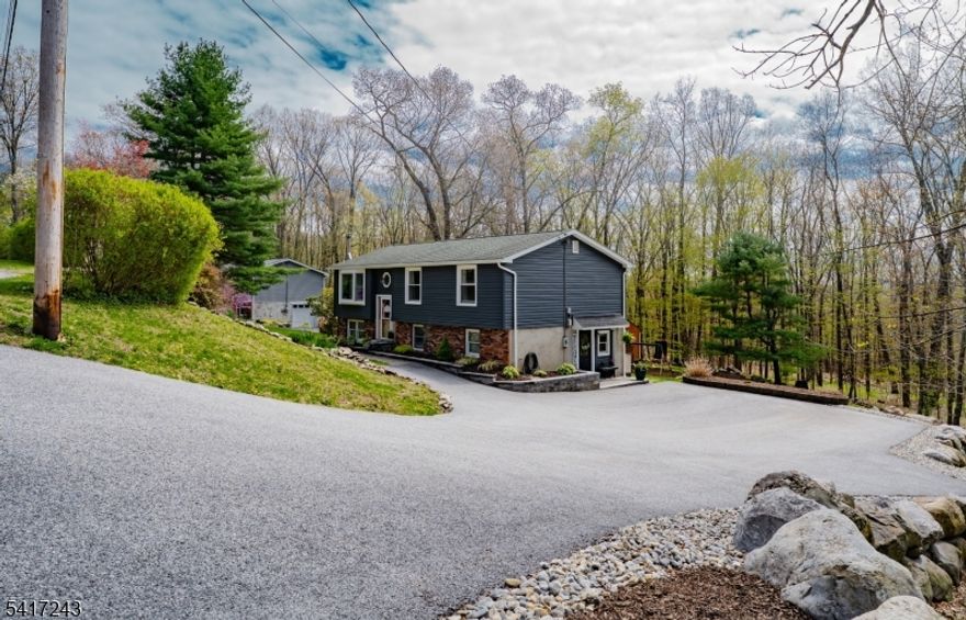 Welcome to this beautifully kept move in ready Wantage home on a quiet dead end street! This home is truly warm and inviting with its open concept layout and sits on just under 1 acre! Spacious living room w/ a large bay window allowing natural sunlight to stream in.  Dining room off the kitchen with a slider to the multi tiered decking that is an entertainers dream!  Large country kitchen with an island breakfast bar! The upper level features a full newer bath and three of the four BR's, pantry closet, and open concept kitchen, living and dining rooms. The lower level offers a finished family room w/ sliders to a stone patio, large bedroom, utility room, storage & laundry room as well as a half bathroom. Central AC, woodstove for those chilly nights, and an expansive private yard.  Side yard is fenced. Large storage shed. Property is backed to farm preserved unbuildable land. Furniture and shelving is negotiable/for sale. 3 bedroom septic.  sold with lot 14=40 Fairview/.39 & lot 20=36 Fairview/.15 totaling 0.93 acres!!