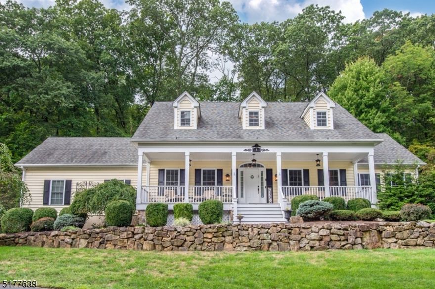 Welcome home! This distinctive colonial with elegant simplicity and timeless appeal will make you feel like you stepped into the pages of House Beautiful. Finely detail interior with custom millwork including crown molding, picture frame wainscoting, built-in bookcases; French doors; wood floors; two-sided gas fireplace; gorgeous gourmet kitchen with high-end stainless appliances to release your inner chef; 4 generous sized bedrooms including the Primary suite with fully outfitted closet to make you swoon and full bath with walk-in shower; main bath with jetted tub and dual vanity; formal dining room; home office/den; full basement, attic and much more. Private fenced backyard with paver patio, hot tub, terraced planting beds, koi pond. Unfinished basement with high ceilings offer possibilities. Less than half mile to Route 206. Minutes to Historic Chester. A dream home!