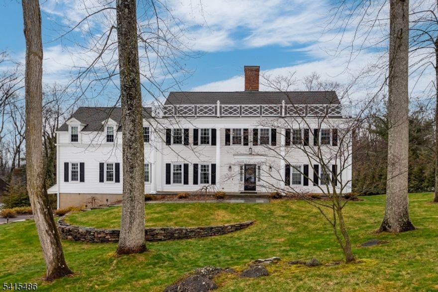 Welcome to refined living in the gated community of Panther Valley. This stately 5-bedroom Colonial blends timeless elegance with exceptional space. A gracious foyer welcomes you into the home, opening seamlessly to the beautifully appointed kitchen, formal dining room & living room. The kitchen is a chef's delight, featuring abundant cabinetry, granite countertops, a paneled Sub-Zero refrigerator, double wall ovens w/built-in microwave & a gas cooktop. A tucked-away laundry room & powder room provide everyday functionality. The charming breakfast room invites relaxed dining w/serene views of the tree-lined backyard & a cozy wood-burning fireplace. You may also step out to enjoy meals & quiet mornings on the screened-in porch or the open second-floor deck. The expansive family room offers abundant space for making lasting memories. Upstairs, you will find 5 spacious BRs. The main bath features a soaking tub, stall shower, sink, toilet & bidet. The luxurious primary suite serves as a private retreat, complete w/multiple closets, a dressing room, toilet & jetted tub as well as a full bath w/double sinks & a glass-enclosed shower. The lower level adds even more versatility, offering a finished den w/sliding doors to the outdoors, a storage room, a large unfinished area w/excellent potential, already equipped with a kitchenette and ready for future customization. Recent updates include: new siding, windows, columns, paver stone walkway, a new front door, patio door & deck door.