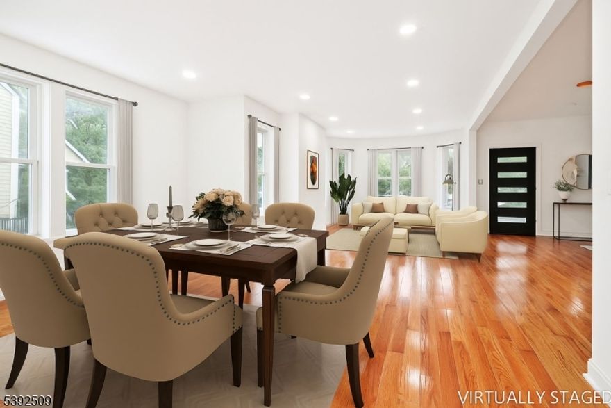 Fully renovated Colonial in the desirable 7 Oaks neighborhood of Orange. Featuring 6 brs / 3.5 baths, en suite, a home office, playroom, and finished basement with powder room & private walkout. The first floor (level 1) includes a spacious bedroom and full bath, ideal for those avoiding stairs. This "Grade A  gut renovation offers all-new plumbing, electrical, heating, windows, insulation, and flooring, showcasing exceptional craftsmanship throughout. The ultra-modern gourmet kitchen comes with state-of-the-art quartz countertops, S-S- appliances, and a peninsula breakfast bar. Custom solid-wood cabinetry includes Lazy Susan, soft-close drawers, and pull-out adjustable shelving. Expansive living and dining rooms feature double sash windows allowing for an abundance of natural light. level (2) includes a home office, laundry room, main bath, and 3 Brs, highlighted by a primary suite with walk-in closet and spa bathroom featuring a soaking tub, double vanity, with soft-close wood drawers, and an illuminated LED mirror. The frameless glass shower is accented with gold fixtures, a built-in wall niche, and marble-style tile throughout.  Level (3) offers two additional bedrooms and a flexible playroom or storage area, completing six bedrooms in total. Other features include dual-zone C.A, linear fireplace, LED bidet toilets with heated seats, and a wraparound porch. Prime location just 30 minutes from NYC with easy highway and bus access.