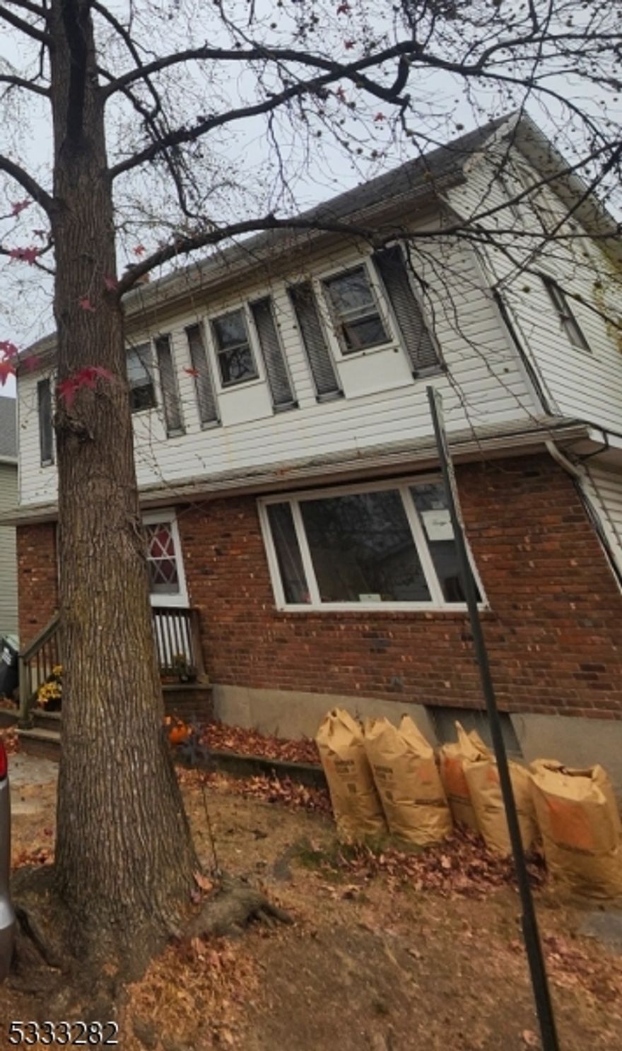 sitting on a quiet dead end street, walk to park and downtown area, level flat backyard.