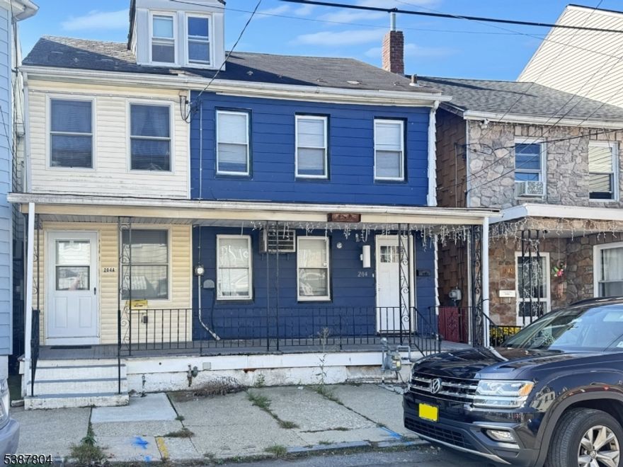 Welcome to 204 Mercer Street   a spacious and inviting 3-bedroom, 1.5-bath Colonial-style Row House in the heart of Phillipsburg. The oversized kitchen offers plenty of counter space and cabinet storage, making meal prep and entertaining a breeze. Flowing right into the open-concept dining and living areas, the main level is perfect for everyday living and gatherings. Upstairs, you'll find three generously sized bedrooms and a full bath, while the walk-up attic provides bonus space for an office, studio, or extra storage. Step outside to enjoy your open front porch, ideal for morning coffee, or head out back to the fenced yard space with a 1-car detached garage accessible from Cherry Ln. Located close to major commuter routes and shopping, this home offers everything you need in one smart package.