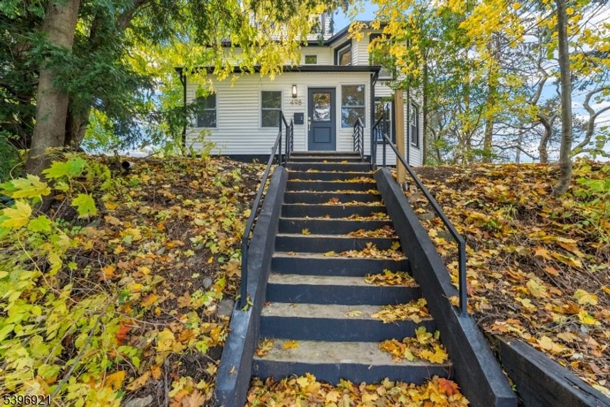 Welcome to this completely renovated move in ready home nestled on a quiet corner lot, offering a perfect blend of modern style and everyday comfort. Step inside to discover vaulted ceilings and rich hardwood floors that flow seamlessly throughout the open-concept living space. The modern kitchen features a large island with quartz countertops, premium finishes, and ample space for entertaining. Enjoy the flexibility of a first-floor office, ideal for working from home or use as a guest suite. With three full bathrooms, thoughtfully designed living areas, and a spacious layout, this home combines elegance with functionality. Outside, the oversized lot provides endless possibilities for outdoor living. Experience the best of contemporary design and comfort in a peaceful neighborhood setting