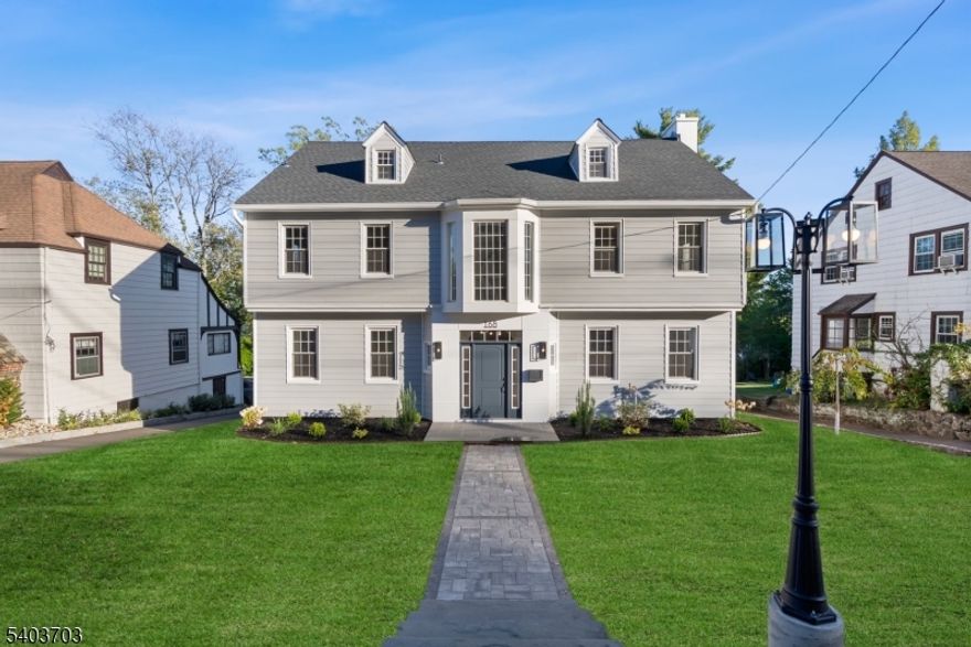 Welcome to this stunning 6Bed/3.2Bath Colonial in prestigious Upper Wyoming. Every inch of this home has been meticulously renovated inside and out with the finest craftsmanship and attention to detail. Spacious, sun-filled layout featuring a gourmet eat-in kitn w/Thermador appliances, custom cabinetry, a separate brkfst room with a beverage center, sliders to new deck, and an elegant formal dining room. Large living room w/FP flows seamlessly into a sunlit den through French Doors, perfect for office/playroom. White Oak Hardwood Flooring Throughout, New Spa-inspired Baths, and new electrical and plumbing systems. The 2nd fl offers 4 generously sized bedrooms, main bath and a primary en-suite.  The walk-up to third floor features two additional bedrooms and two expansive cedar closets, a true showstopper! Fully refinished basement includes new French drains, sump pump. Outside, the property shines with a brand-new 50-year GAF roof, new premium insulated siding, new gutter and drainage systems, and new wrap-around deck. Professionally landscaped grounds with new grading and new sprinkler System throughout. New paver walkway, and bluestone front steps. A New driveway and front sidewalk will be completed before closing. Located in a top-rated school district, this home offers easy NYC access w/Jitney at the corner or less than 1 mile to the train station. Experience the perfect blend of historic charm and modern sophistication. HIGHEST AND BEST DUE TUESDAY 1/13@5pm.