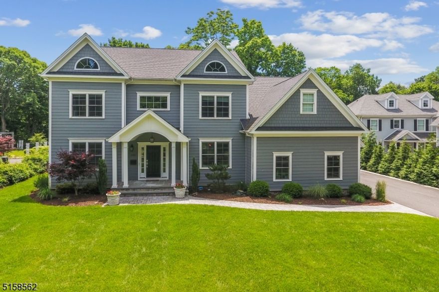 Beautiful three-year-old Center Hall Colonial with great spaces and very high-end finishes.  Perfect flow for entertaining and everyday living inside and out.  Upon entering the front door, you come into a lovely foyer with living room on the left and a large dining room with tray ceiling on the right.  The kitchen is a cooks delight with a large center island and Viking appliances that open up to a spacious family room with fireplace and easy access to the fenced rear yard with patio and brand-new high-end Rainbow Play System.  Just off the kitchen is a mud room and entrance to the two-car garage. A powder room and in-law suite complete the first floor.  The second floor offers a spacious master suite with two walk in closets and an incredible master bath as well as three other bedrooms, two full baths and the laundry room. The third floor is open space with lots of office or play areas. The basement is impressive space with media space with surround sound, recreation, exercise and office rooms as well as a full bath.  There are nine-foot ceilings starting in the basement and going through the second floor.  The convenience of being less than a mile to downtown Summit cannot be beat.