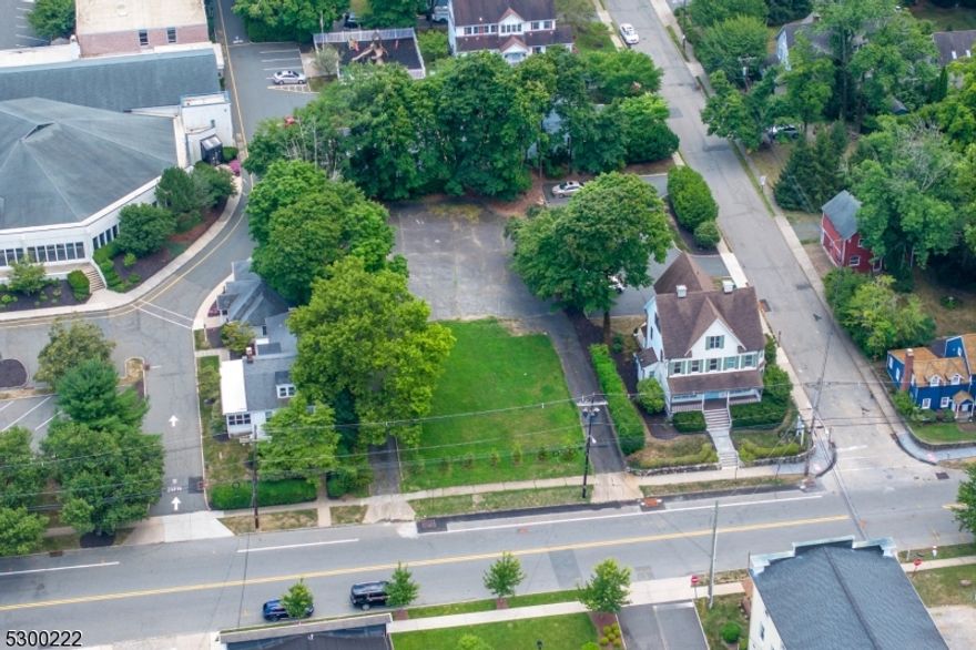 Prime location in downtown Mendham. No structures on the property. Paved driveway and parking area. . Bring your imagination!