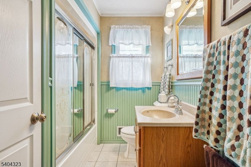 Welcome to this expanded and thoughtfully renovated three-bedroom, two-bath Cape Cod, where classic charm meets modern comfort.  The heart of the home is the sun-filled living room, featuring a cozy gas fireplace and an open-concept flow into the dining area -- perfect for both intimate evenings and lively gatherings.  The seamless layout enhances everyday living while maintaining the warmth and character Cape Cod homes are known for.  The home's expansion adds valuable space and exceptional storage, offering a place for everything without sacrificing style or function.  Generously sized bedrooms and updated bathrooms provide comfort and flexibility, while thoughtful design details throughout create a welcoming, move-in-ready experience.Step outside to a spacious outdoor deck, ideal for morning coffee, summer entertaining, or unwinding at the end of the day.  Walking distance to Fanwood's town center and train station.  With its bright interiors, abundant storage, and blend of timeless appeal and modern updates, this home offers effortless living in a setting that feels both inviting and refined.