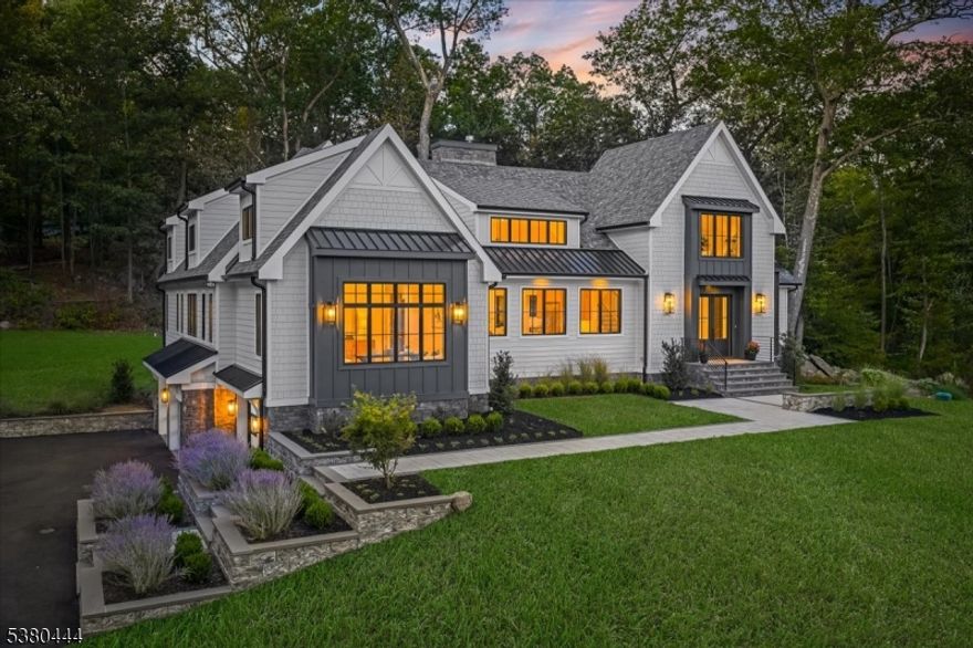 New Construction Dream Home, designer styled and newly curated. This one of a kind custom residence located on prestigious West Shore Drive in Smoke Rise. Home offers breathtaking panoramic lake front views, dimensional soaring ceilings w/9ft doors and European white oak flooring sets the tone of elegance and warmth. Dramatic chef's kitchen features top of line Viking appliances, dual sinks/dishwashers, 8 burner gas range, quartz waterfall island, and butler's pantry. Stunning great room is anchored by a floating gas fireplace surrounded by italian marble and double french doors leading to a paver patio. Luxurious primary en-suite showcases Versace tile, oversized multi-jet shower, soaking tub and custom designed dressing room w/secondary laundry, three additional bedrooms with en-suite bathrooms complete the main level living area. Sweeping OPEN Staircase flows to upper level offering dramatic ceilings, wall of windows overlooking the lake, w/ flexible space ideal for lounge, office or creative retreat. Lower level with walkout entrance provides multiple entertaining areas, stylish lounge and game area with media/flex space. A private bedroom and full bath provides perfect accommodations for guests. Additional highlights, 3 car garage with polished concrete flooring, professional landscaping, sprinkler system, smart home, Sonos, Aroma 360, and 24/hr gated security, private beach and dining. Dramatic windows flood the home with natural light and lakefront beauty.