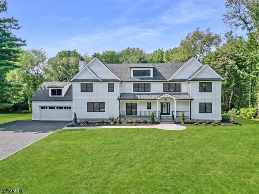 Welcome to this specatucular seven bedroom custom home situated on over an acre of land on the south side of Scotch Plains! Greeted with a bluestone front porch, enter in to the two story foyer w/ herringbone white oak floors, a chef's kitchen featuring high-end Thermador appliances, a natural wood island, quartz countertops, custom cabinetry and a separate dinette area with a sliding door open to the covered front porch. Family room open to kitchen features a white oak dry bar, a custom stone 42 " gas fireplace and double doors out to the professional lanscaped backyard. Additionally the first floor holds a spacious dining room with built in cabinetry,  a bedroom en-suite with sliders out to a private patio, and a second bedroom or home office.  Oversized Anderson 400 series black windows with several paneled doors on the first floor flood this home with natural light throughout. Second level holds 4 bedrooms-ALL EN-SUITE and a walk in laundry room. The primary bedroom features custom moldings, vaulted ceilings, and an outfitted HUGE closet. The primary bathroom features a double vanity, oversized tiled shower and a beautiful soaking tub for ultimate relaxation. Lower level includes a bedroom with a full bath, a custom built in bar with quartz countertops & a sprawling open space for recreation. The backyard features a pavered patio, sod (front & back), underground sprinklers and a full home generator. Unpack your bags, move right in, and experience luxury at its finest.