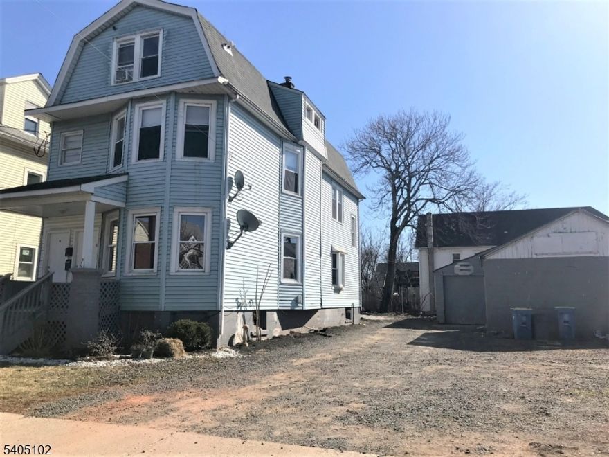 Beautiful renovated large two family, new roof, newer kitchen with 42 inch maple cabinets, granite countertop, stainless steel appliances, two units of furnace and AC condenser, hard wood floors,  ceramic tiles, washer/dryer in basement. full attic and basement. large two car garages with  large parking lot, park 6 cars. great home, will not last!!!