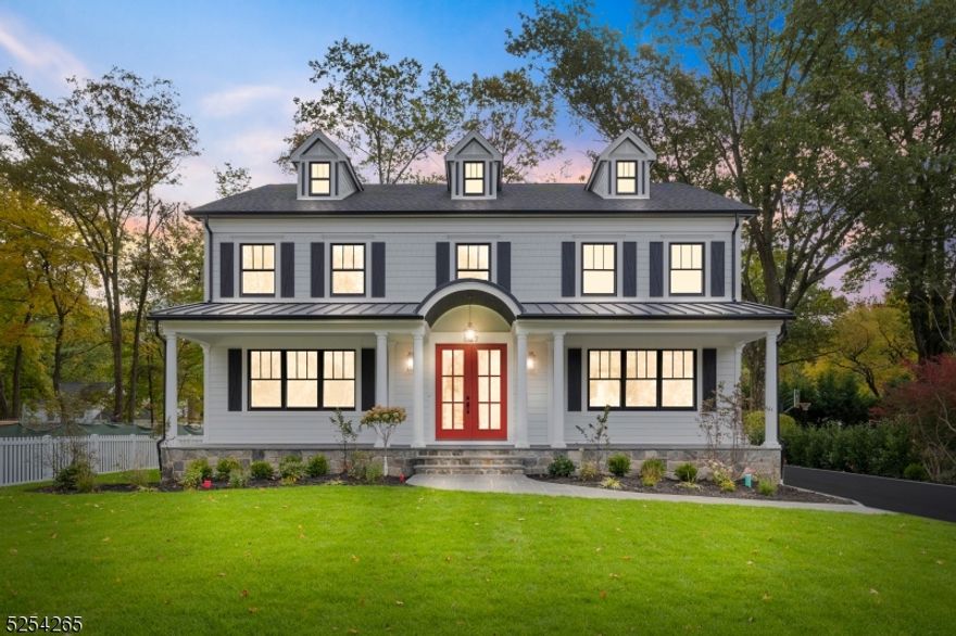 Discover this brand-new Buontempo construction Home. A Classic Center Hall Colonial, gracefully situated in one of Westfield's coveted neighborhoods. As you enter from the blue stone front porch, a meticulously crafted circular staircase greets you, setting the tone for a home of unparalleled elegance, while a FDR flows into a butlers pantry, walk-in pantry, and a beautifully appointed kitchen with Thermadore SS appliances, quartz countertops and panoramic views of the lush backyard. Hardwood floors throughout and custom crafted molding details adorn the walls and ceilings. The first floor is completed with a FLR, en-suite guest room, PR,\mud room and open EIK/FR. The dreamy main bedroom suite on the upper level boasts dual walk-in closets, fulfilling your every desire is the main bath with dual sinks, a dream shower area and a fabulous soaking claw foot tub. The 2nd fl continues w/3 more BRs. J&J BA between 2 BRs and 1 BR w/en-suite BA, and a full size laundry room.Another BR w/en-suite bath fills the 3rd floor. The open basement offers limitless potential, allowing you to create a space tailored to your preferences.Masonry steps to backyard patio are accessed through the sliding doors, w/lush mature trees and room for a pool. All 4 levels of finished floor space is over 6500 Sq.Ft. Completing this estate is a detached 2-car garage and an extensive driveway that truly sets it apart. Embrace a lifestyle of luxury in Westfield. Only 2 blocks to Tamaques Park, Close to schools.