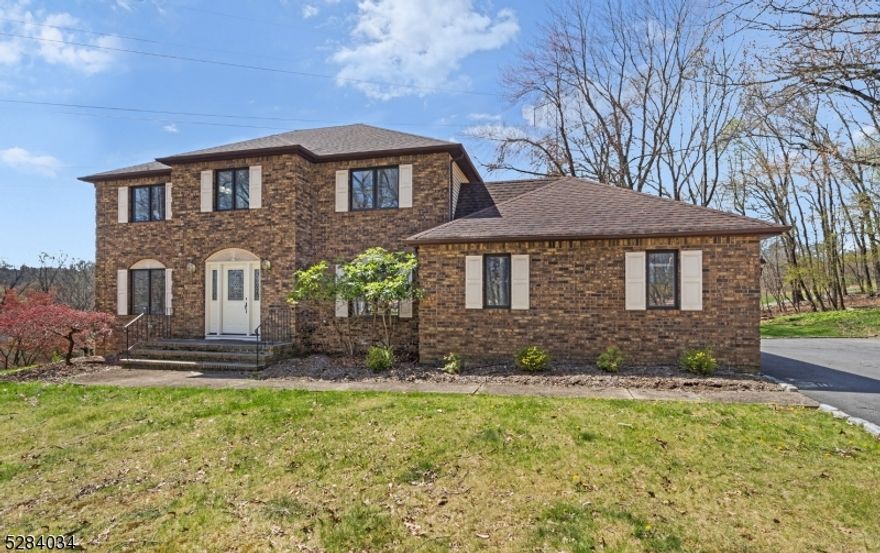 Welcome to 46 Shongum Road, a timeless Center Hall Colonial residence nestled in the sought-after Shongum area of Randolph. This charming home offers 4 bedrooms, 3.5 baths, and a host of desirable features including spacious bedrooms with hardwood floors waiting to be revealed underneath the carpeting. Large Kitchen seamlessly flows into the cozy living room, complete with a wood-burning fireplace and large windows that bathe the space in natural light. Sliding doors lead from the living room to a generous deck, perfect for outdoor dining and entertaining. Below, a rare walkout basement awaits, boasting a comfortable living room, a second kitchen, full bathroom and two additional rooms that offer endless possibilities. Whether you dream of creating an in-law suite, a recreation area, or a home office, this versatile space is sure to impress. For formal occasions, the elegant formal living & dining rooms provide the ideal setting for gatherings with family and friends. Parking is a breeze with a spacious 2-car garage with 240V outlet, while a large storage shed provides ample space for all your outdoor essentials. Plus, enjoy the privilege of lake rights to Shongum Lake, where residents can partake in summer holiday BBQs, progressive dinners, fishing, boating, and swimming. Don't miss the opportunity to make this hidden gem your own a perfect blend of comfort, convenience, & community awaits at 46 Shongum Road.