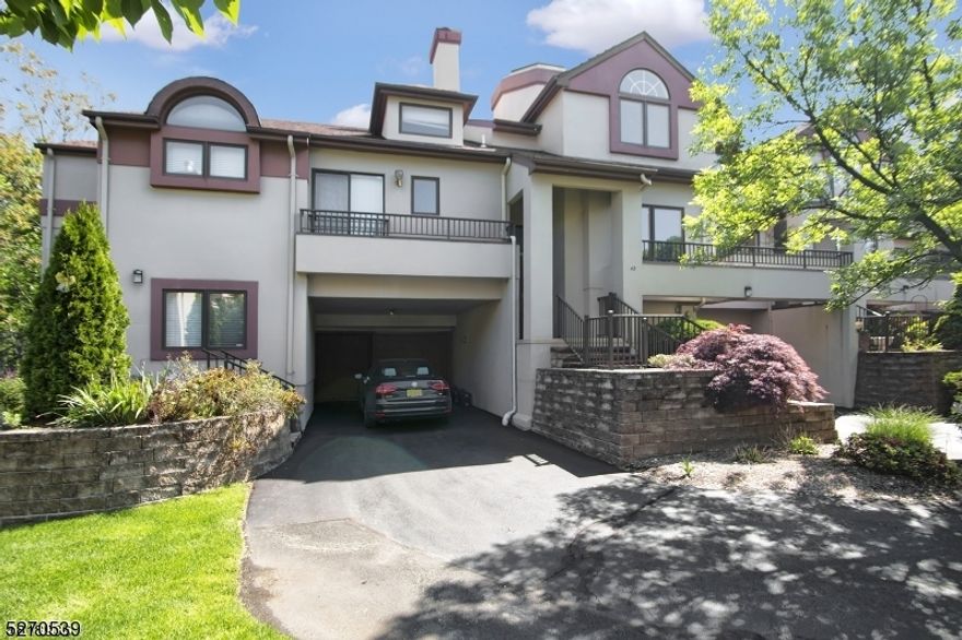 Welcome home to this beautiful 3 BR/2.1 BA town home in West Orange. Incredibly bright and airy, the open floor plan flows effortlessly around a two-sided gas fireplace that anchors the heart of the home. Skylights throughout allow the glorious sun to shine in! The newly updated and spacious kitchen with an eat-in island is a chef's dream. Kitchen is open to the large dining room - perfect for entertaining! Ideal primary ensuite - the primary bath has been renovated and includes a soaking tub. Lower level includes Washer/Dryer, and home office. Sliding doors from the dining and living room open onto a large deck with a gas grill connected to gas from the house. You will never have to run and fill up the tank again. The shared backyard area is perfect for play and is accessible from the 2 car garage with 2 EV chargers. Just off of Northfield Ave with easy access to West Orange and Livingston. Pictures from previous listing. Available April 5th! Unit will be deep cleaned before move-in.