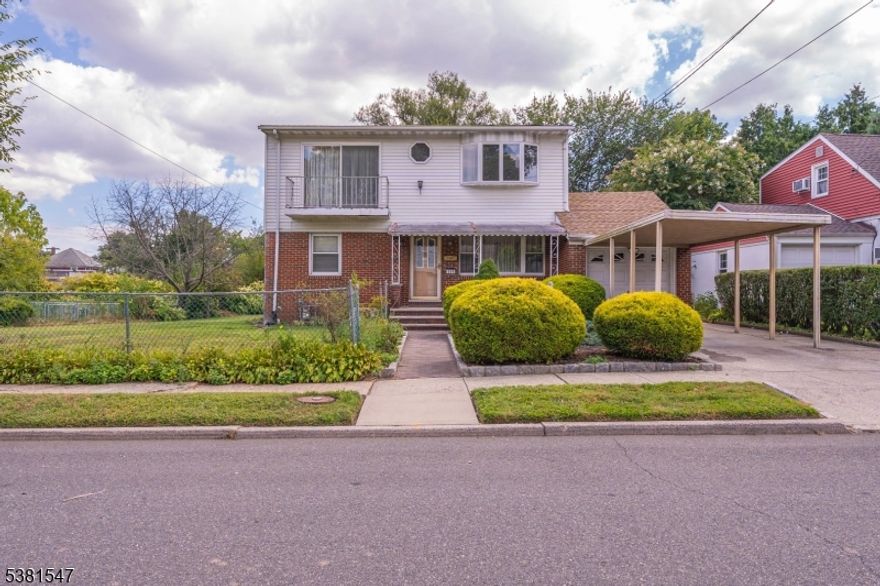 Spacious Colonial offering 1,860 sq. ft. of living space plus a full finished basement, perfectly situated on a double lot. The ground floor features a welcoming living room with hardwood floors, a spacious eat-in kitchen, two bedrooms, a full bath, and a large, enclosed back porch filled with windows that bring in plenty of natural light. Upstairs, you'll find a generous sitting area, three additional bedrooms, and another full bath, providing ample space for everyone. The finished basement includes a laundry room, full bath, and two separate summer kitchen areas, adding both functionality and convenience. With a total of 5 bedrooms and 2.5 baths, this beautiful colonial has space for everyone and opportunity for expansion. This home also includes a one-car garage, a spacious yard with a storage shed, and plenty of room for outdoor enjoyment. Conveniently located near public transportation and shops, this property offers both comfort and accessibility. The home is in need of some TLC, making it the perfect opportunity for its next owner to bring their vision to life.