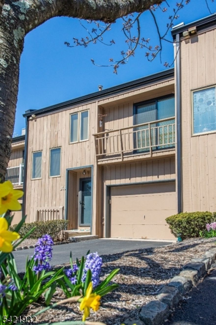 Nestled high among the hills in desirable Lindsley Heights, this beautifully updated 2 bdrm, 2.5-bath townhouse offers an open-concept layout, abundant natural light & breathtaking panoramic mountain views. The main level welcomes you with an inviting entry foyer & convenient guest closet, leading into a stylish eat-in kitchen featuring white shaker cabinetry, crown molding, quartz countertops, stainless steel appliances, & a built-in quartz table top. A cozy wood-burning fireplace anchors the spacious living and dining areas, which flow seamlessly to a private deck perfect for relaxing or entertaining while taking in the stunning scenery. Upstairs, a dramatic family rm with vaulted ceilings, exposed wood beams & a sliding glass door to a charming Juliette balcony creates an airy & versatile living space. The primary suite offers a beautifully updated en-suite bath & a generous walk-in closet, while a second bedroom & full hall bath complete this level. The walk-out lower level provides exceptional flexibility, featuring a rec/media room ideal for entertaining, a home office or potential 3rd bedrm, along with a laundry area & ample storage space. Recent updates inc: an Eat in Kitchen & HWH 2020, roof 2024, the deck,sliding glass doors & primary bath 2025. Additional highlights include an attached garage with electric opener & a driveway accommodating 2 cars. An exceptional opportunity to own a home in a sought-after town with great schools & amenities that truly has it all.