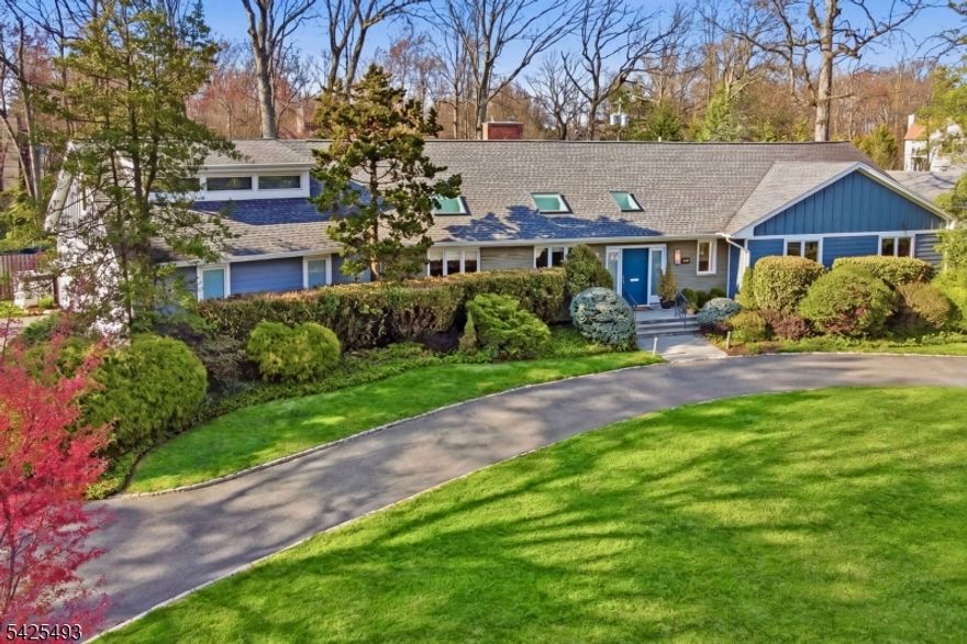 Set in the desirable Newstead neighborhood, this distinctive 1954 turn-key mid-century modern ranch is defined by light, scale, and a remarkable setting. With over 4,000 sq ft of flexible living space, 5BRs, and 4.1Bths, the home is flooded with natural sunlight and framed by oversized picture windows. A generous foyer with a new powder room opens to the main living area, where the WOW factor is the spacious living and dining room with huge picture windows, a wbfp, and a family room overlooking the expansive property. Nearly an acre of fully fenced, level grounds create a rare backdrop for everyday living and entertaining. The EIK features granite counters, a Sub-Zero refrigerator, Miele dishwasher, double wall ovens, and 2 skylights. The primary suite addition offers a private retreat w/heated bluestone patio, sitting room, stunning full bath, and a giant WIC. Two additional graciously sized BR's and a hall bath round out the bedroom wing. A 3-car attached garage opens to a mudroom with laundry, an additional BR, and full bath. The second level features a fifth BR, full bath, and a generous bonus space w/windows overlooking the backyard, ideal for an artist studio, office, or rec room. 2016 updates include custom built-ins, 3-zone HVAC, humidifier, UV systems, 2 water heaters, whole-house generator, French drains, and a dry utility basement; a new roof and Hardie Plank siding complete this impressive Newstead offering with presence, privacy, and exceptional livability.