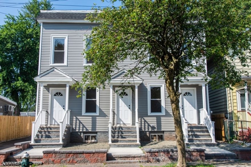 Don't miss this rare investment opportunity in the heart of Montclair! Fully renovated in 2025, this turnkey 4-unit property on Washington St features 4 residential units. The residential mix includes three spacious 2-bedroom units and one large 4-bedroom, each with its own designated parking space in a brand new, exclusive blacktop lot. The building has been completely overhauled with all-new electrical and plumbing systems, brand-new tankless water heaters for every unit, a new roof, and new siding. Each unit offers brand-new kitchens, modern bathrooms, in-unit washer/dryers, great ceiling height, new hardwood flooring throughout, brand-new HVAC, and separate utilities. Delivered 100% vacant, the property is ready for immediate lease-up with excellent upside potential in one of Essex County's most competitive rental markets. Ideally located just blocks from Bay Street Station (with Midtown Direct service to NYC), and close to Bloomfield Avenue's restaurants, shops, and amenities, as well as the newly redeveloped Glenfield Park offering green space, sports courts, and community events.