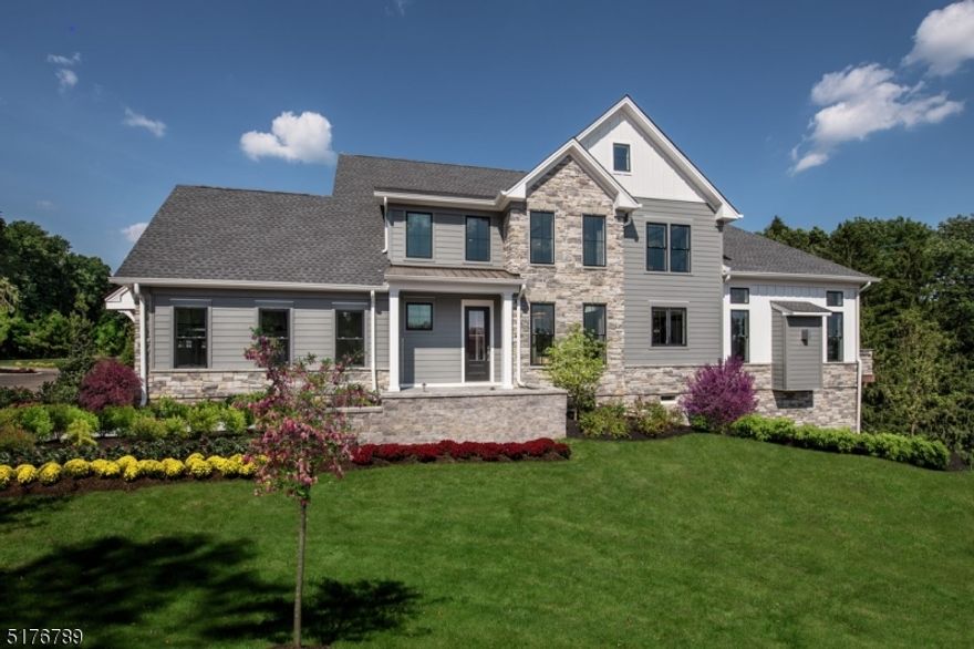 The Gratitude Farmhouse features an expansive covered porch that invites you to a spacious two-story foyer with open views to the gourmet kitchen, dining area, and spacious great room. The open concept in this home is great to entertain guests in the extended great room with designer gas fireplace. The kitchen features JennAir stainless steel appliances, quartz counters, center island, a spacious walk-in pantry and access to outdoor living area. The first floor living also includes a guest bedroom with full bath. Secluded on the second floor is the expansive primary bedroom, complete with a walk-in closet and a resort-style bathroom suite. The second level also offers guest bedrooms, laundry room and a generous loft. The unfinished basement offers storage space and walk-out to outdoor living. Perched on a corner homesite allowing full afternoon sun to enter the many side windows plus, the outdoor deck offers pristine Eastern views of the communities' mature trees. This home is fully loaded with designer features, expanded deck and will be ready to close this Winter.