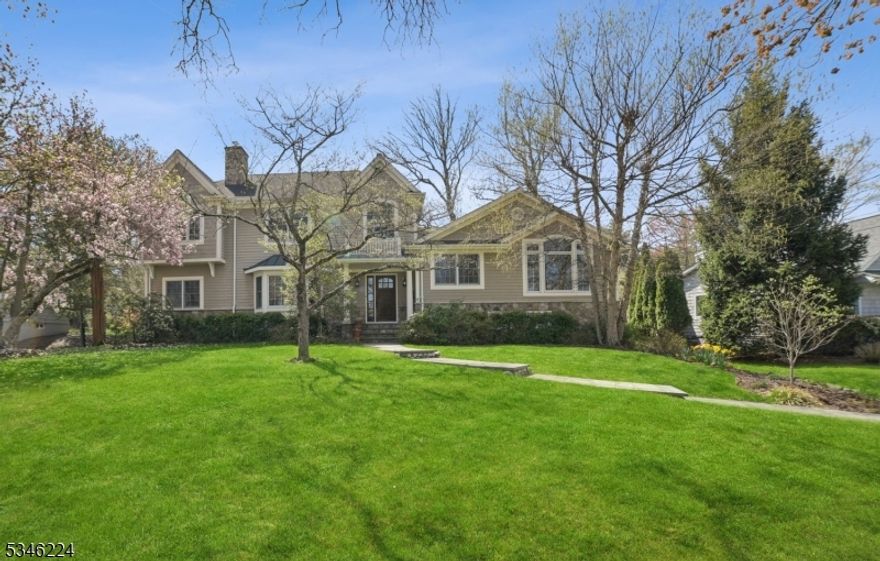 Welcome to 15 Wordsworth Road! Nestled in the coveted Poets Section of Short Hills, this exquisite  five-bedroom, four-bathroom custom home offers an unparalleled blend of traditional charm and modern amenities.Renovated and expanded in 2006, this home is designed for both luxury and comfort, highlighting spacious living areas and thoughtful details throughout. The main floor boasts a bright and welcoming two- story entrance foyer, with the living room and family room sharing a two- sided fireplace- providing the perfect ambiance for cozy evenings.You will love the brightly lit eat-in kitchen, featuring white wooden cabinets, Carrara quartz countertops, a farmhouse sink, hardwood flooring and stainless steel appliances.The luxurious primary bedroom,  located on the second floor is a true retreat with a gas fireplace, an en-suite bathroom with dual vanities, radiant heat floors, a soaking tub and a steam shower plus a large walk-in closet. The additional bedroom on the second floor is currently used as a home office. On the spacious third floor, you'll find three bedrooms with ample closet space, plus two full bathrooms, and a second family room - ideal for a playroom or media room. Enjoy the private backyard, complete with a serene patio perfect for outdoor dining and entertaining. Just minutes away from top-rated schools, parks, shopping, and public transportation!