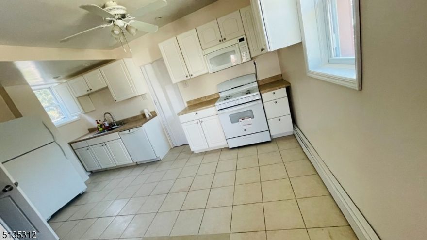 1st floor apartment with 1 bedroom and a walk-in closet that can be used as a small second room or home office. Open living room and kitchen space. Quiet neighborhood with a convenient location. Street parking available. Move-in ready January 15.