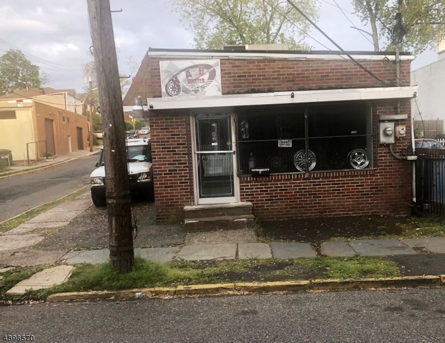 A warehouse Or Retail / Storage Mixed-Use one story building with two garage overhead doors. Heating with central air conditioning systems  Property is currently rented on month to month and zoned commercial . Very motivated seller.