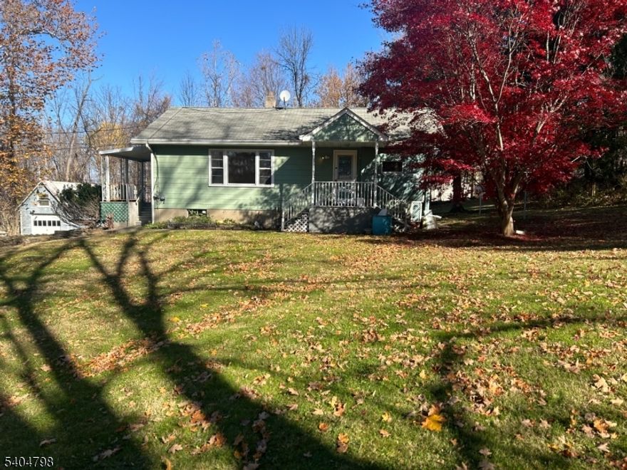 Spectacular location! Set back on a large, beautiful lot where you are close to everything but still very private. Minutes to Mountain Creek to the left, Heaven Hill Farm and Warwick NY are minutes to the right. Generously sized bedrooms with gorgeous hardwood throughout. The bathroom has just been remodeled so everything is brand new! Full basement so you have plenty of storage, Living room views of the Mountain!