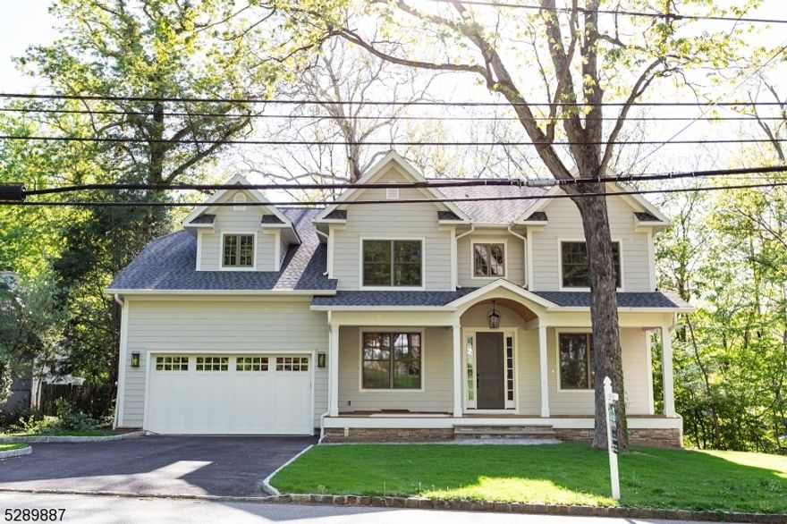 This spectacular brand new construction home is  approximately 6000 sq ft.   A collaboration between AB Design and CWI Design, this residence is a true masterpiece. It features soaring ceilings.  5 Bedrooms, 4.2 Baths, premium gourmet kitchen open to family room, oversized custom windows, white oak flooring, hardy siding, a large back yard deck overlooking private yard and Front Porch. The layout offers incredible flexibility, with expansive space throughout.   Every element, from the designer lighting and fixtures to the meticulously selected hardware, is a testament to an unwavering commitment to quality and style.  Perfectly positioned close to schools, the town center, and trains.