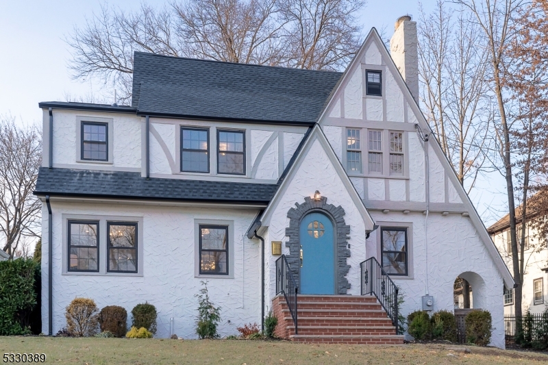 This beautifully renovated & designer curated Colonial offers the perfect blend of modern luxury & classic charm. Everything old is new again in this completely updated home which has been totally remodeled from top-to-bottom. You can't help but notice the attention to detail as you soak in the quality of exceptional workmanship and decor. Featuring 4 spacious bedrooms & 4.1 baths, this home has been meticulously designed to offer todays sought after open & comfortable lifestyle, while preserving its timeless architectural character. The main floor is bathed in natural light as you move from room to room. Oversized Living Rm w/ wood-burning fireplace will greet you as you enter thru the front vestibule. Broad, curved arches lead you to the sun-drenched Den & Dining Rm. Open to the Dining Rm, the must have Chef's Kitchen w/ custom cabinetry, top of the line SS appliances, elegant stone counters & huge center island is the ideal gathering space. Large sliding doors provide easy access to the rear paver stone patio & lush, level yard. Powder Rm. Not to be missed, the 2nd Fl consists of the Primary suite complete w/ a spa-like en-suite Bath & WIC. 2 more spacious BRs & hall Bath. 3rd Fl is where you will find the 4th BR & full Bath, perfect for guests. The completely finished Lower Level adds even more living space featuring a Recreation Rm w/ entertainment bar, Office/Gym, full Bath & Laundry Rm. Detached 2-car Garage, Around the corner for jitney to NYC direct trains.