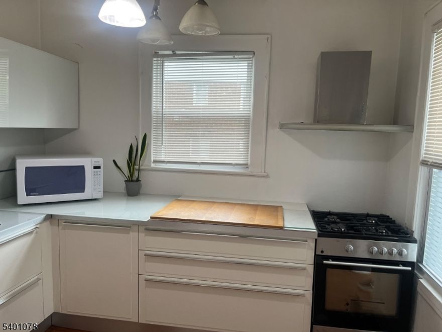 Spacious & Bright First-Floor Apartment in Prime Location! Move right into this large, clean, and well-maintained 3-bedroom, 1-bath first-floor apartment located in a highly desirable neighborhood. This unit offers a spacious layout featuring a generous living room, a separate dining room. Enjoy the perfect blend of comfort and functionality, ideal for today's lifestyle. Conveniently located near shops, major highways, and NJ Transit. ALL UTILITIES ARE INCLUDED. 1 parking space available.