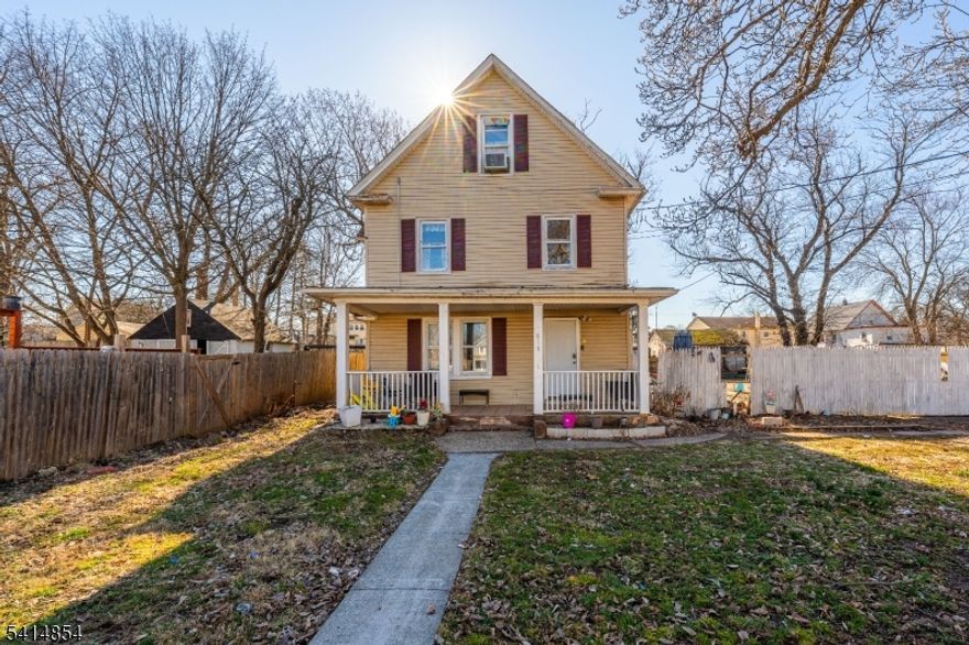Welcome to this rare mother-daughter style Colonial situated on a double lot in the highly desirable Netherwood Heights neighborhood. Partly refreshed in 2025, this exceptionally spacious home provides flexible living arrangements across four distinct levels, making it a fantastic opportunity for various living situations. Come in from the classic open front porch to the first level, which shines with sleek flooring and a gorgeous modernized kitchen boasting crisp white cabinetry, and a lovely peninsula. This bright space flows effortlessly into a sunlit dining area and a living room, complemented by two well-proportioned bedrooms, a bonus room to suit your needs, and a full bathroom. Upstairs, the second level features a cozy second living room, an additional dedicated kitchen, two more bedrooms, and another full bathroom. The finished attic is a fantastic bonus, complete with its own full bathroom, making it appropriately set up for a private primary suite or retreat, making it the floor's third bedroom. Downstairs, the finished basement expands your options with a full bathroom, a generous recreation space that currently highlights its potential for a home studio or gym, and an additional room. Outside, enjoy a remarkably deep driveway for ample parking, a sprawling backyard ready for summer gatherings, and eco-friendly solar panels. Conveniently located just blocks from the Netherwood Train Station and the bustling shops along South Ave!
