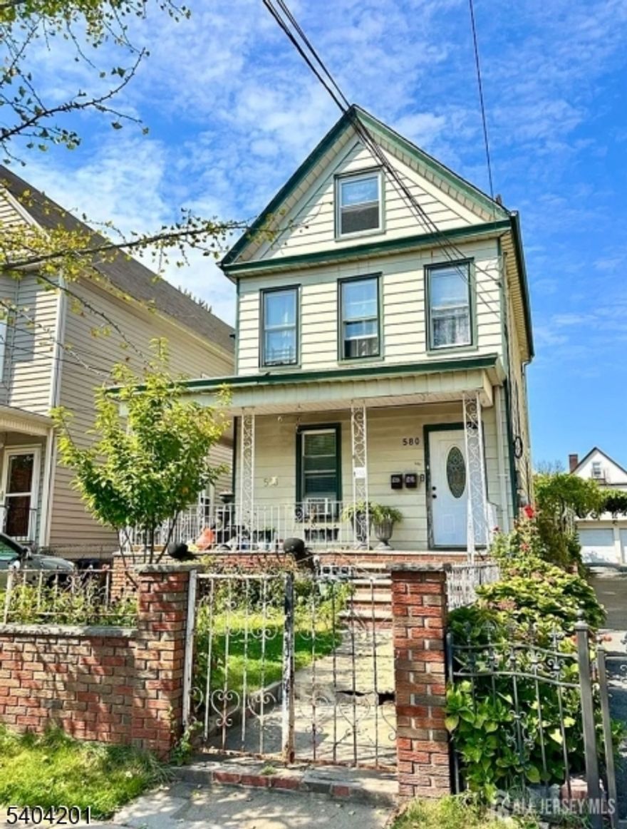 Welcome to this 2 Family Property located in a desirable area of Elizabeth City, Near Shopping, schools, public transportation and only 5 minutes away from EWR Airport.This property has 2 bedrooms living room, eat-in kitchen and full bathroom. in each unit. The attic is a bonus space for storage as well the baseman. a large fenced backyard is very ideal for BBQ in the summer. Additional features include a driveway with parking for one car. don't let it pass the opportunity to own this spacious home and schedule a visit.