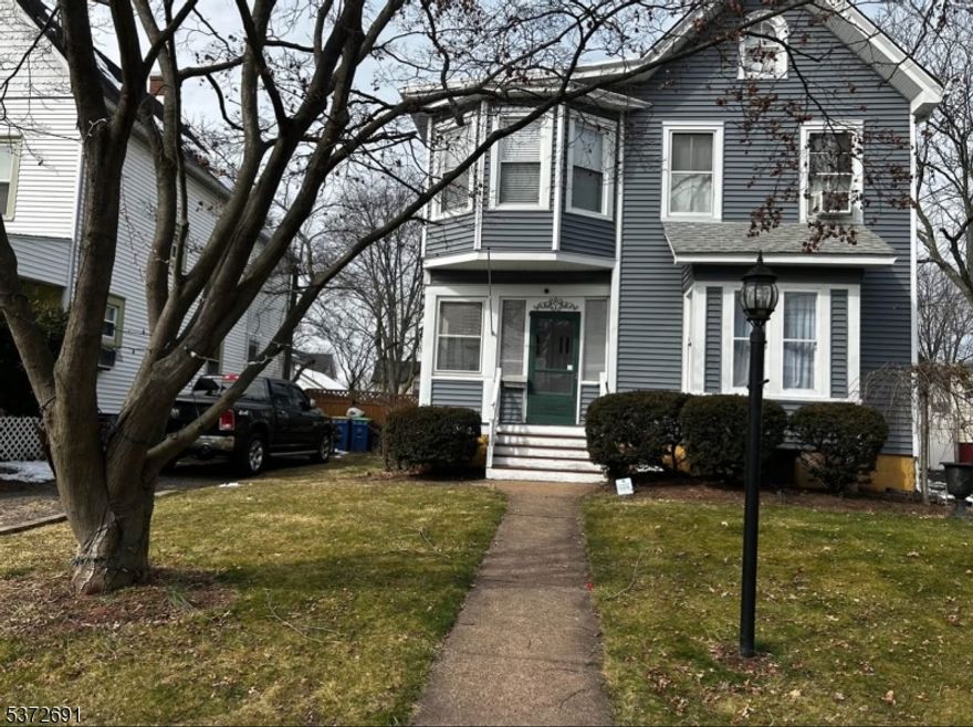Welcome to this spacious 5-bedroom, 2-bath single-family home situated on a generous lot in North Plainfield. Bursting with potential, this home features hardwood floors, formal living and dining rooms, and a large eat-in kitchen. The full basement offers additional space for storage or future expansion. With a bit of updating, this property can truly shine perfect for homeowners looking to personalize or investors seeking value. Conveniently located near schools, shopping, and transportation. Don't miss the opportunity to make this charming home your own!