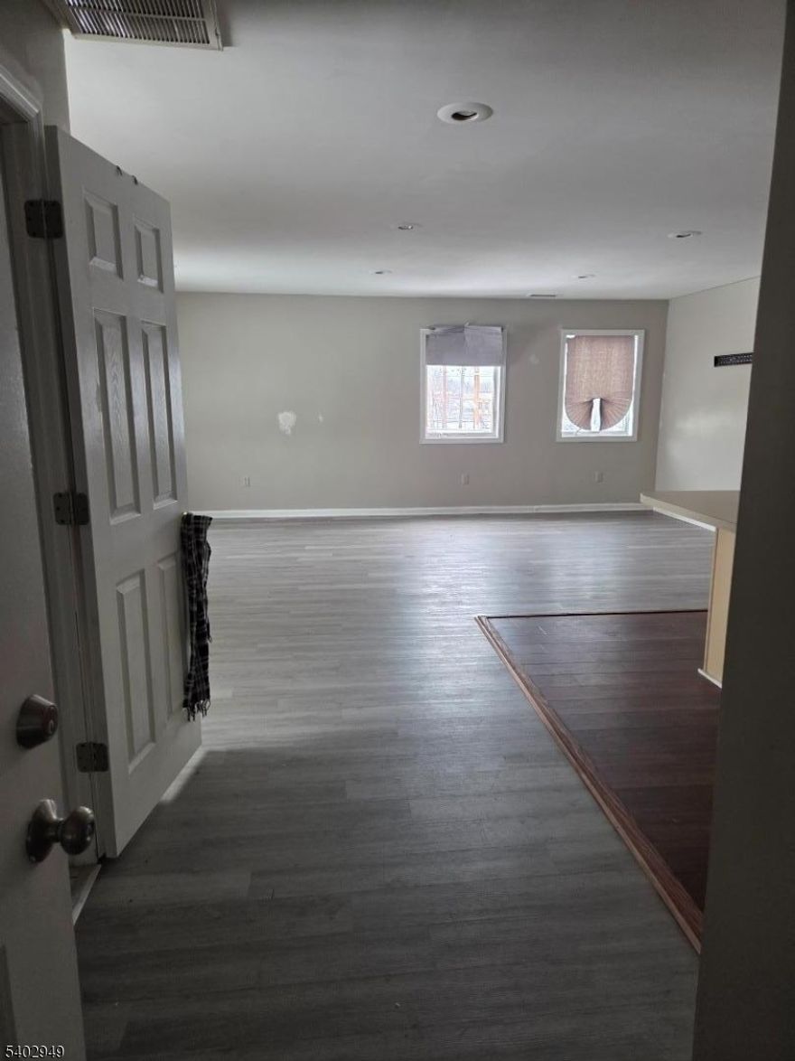 Beautiful spacious second-floor 3-bedroom, 2 full-baths apartment  featuring an open-concept floor plan. The unit offers a bright living room, large kitchen with dining area, and an in-unit laundry room with washer and dryer hook up. Conveniently located near schools, shopping centers, parks, restaurants, and public transportation. Easy access to the Garden State Parkway, Route 1 & 9, and the NJ Turnpike.