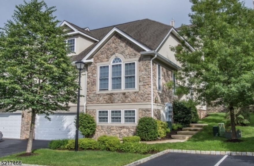 You must see this fully updated unique Tulane model 4 bedroom, 3.5 bathroom townhome. Gleaming hardwood floors throughout first floor. Large Living Room with gas fireplace. Luxury large kitchen with upgraded cabinetry and granite countertops. Light gray NEW mohawk Smartstrand hypoallergenic carpets in upstairs spacious bedrooms. Basement is fully finished with storage, office/ potential for 5th bedroom and full bathroom which walks out to garage. Amenities incl: clubhouse, pool, tennis courts. Close proximity to major highways; Rt. 10, 80, 287, Trader Joe's and so much more! Snow and leaf removal included . 240V electric vehicle charger in garage. Just unpack & enjoy!