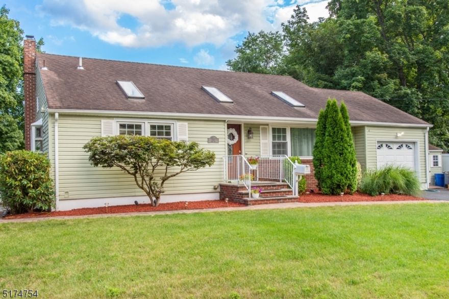 This home checks off all the boxes! Great ready to fall in love with this warm and inviting place to be your 'home'! Features and benefits include: Inground pool with oversized lot - updated custom kitchen - vaulted ceilings - open floor plan - central air - forced hot air heat - 2 auxiliary sheds - ample off-street parking - city sewer - city water - sprinkler system - skylights -  easy access to trains, planes, parks, golf course and schools.  The perfect all season home and in the summer, spend it in your backyard with your salt water pool! Look no further.