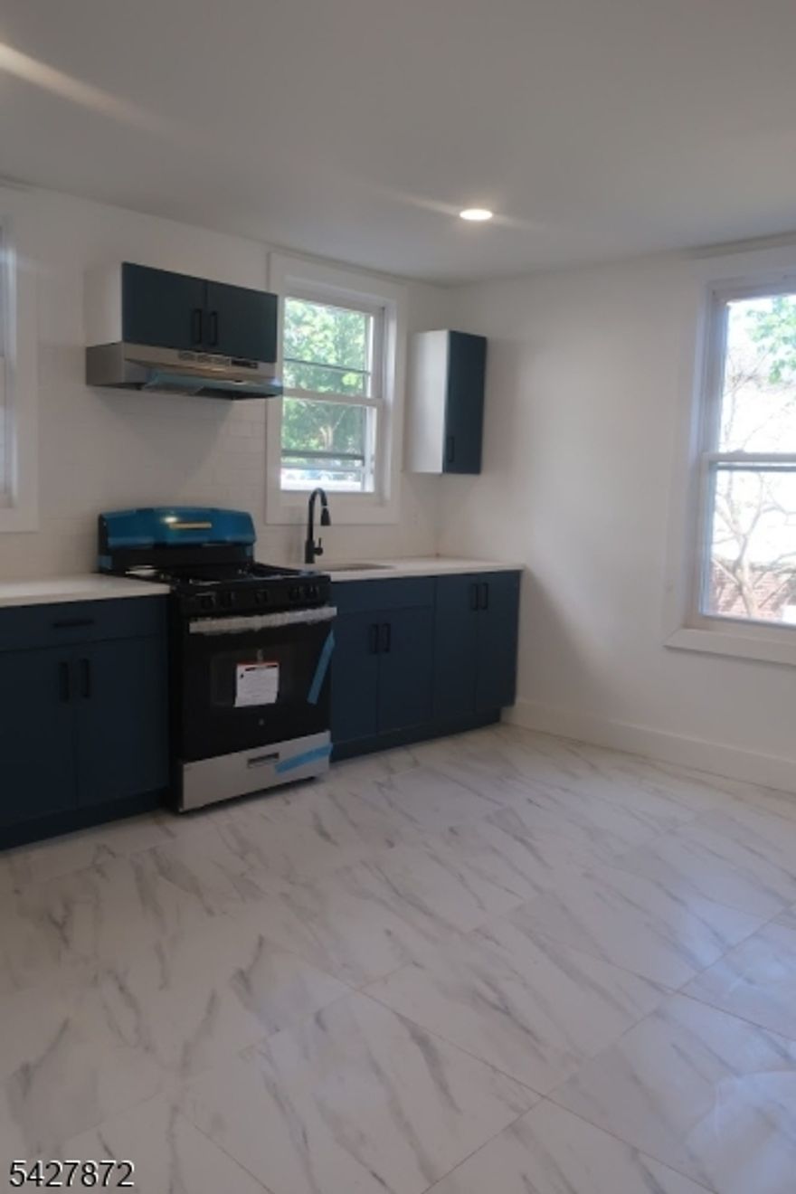 Welcome to this beautifully renovated 3-bedroom, PLUS BABY ROOM, 1-bathroom apartment on the 2nd floor. This bright and updated unit features modern finishes, a clean and comfortable layout, and plenty of natural light throughout. It is conveniently located next to downtown Newark, public transportation, and local amenities. This apartment is perfect for anyone seeking a fresh, move-in-ready apartment!