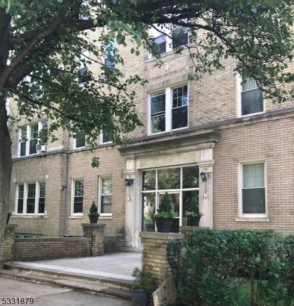 Lovely old world charm meets newer updates in the large first floor apartment. Original details of oak parquet floors, high ceilings, picture molding and pantry are still intact in this lovely unit.Mix of wood floors, tile and one bedroom is carpeted.