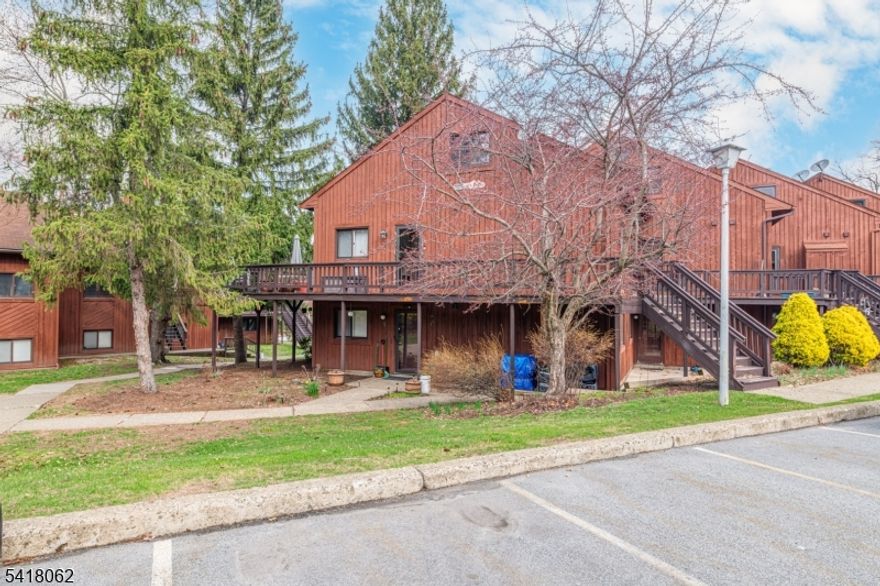 Spacious 3-bedroom, 1-bath end-unit condo featuring decks on two sides to Enjoy stunning mountain views. The open floor plan layout has been updated with newer carpet in the living room and laminate flooring in the kitchen. This unit has a rare Straight staircase leading to a versatile loft space. Custom motorized window shades in the living room are included. Conveniently located toward the bottom of the mountain and close to the community pool. Four-season recreation at your doorstep -  Mountain Creek Resort as well as Minerals Spa & Fitness Center.