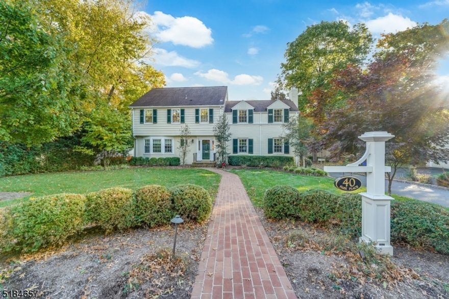 MAGAZINE WORTHY turn-key home located in the heart of prestigious Old Short Hills incredibly close to Glenwood School, Short Hills Train Station, Hartshorn Arboretum and downtown Millburn.  Situated beautifully on a sought after block, this 5 Bedroom, 4 Full and 1 Half Bath stunner has been brilliantly renovated from top to bottom with every modern convenience imaginable.  Fantastic for entertaining on any scale.  To-die-for Gourmet Chef's Kitchen with custom cabinetry, Cambria quartz countertops, Wolf/Sub Zero/Bosch appliances (2 dishwashers!) and magical Breakfast Area.  Spectacular Family Room off Kitchen with soaring ceiling, fireplace and custom built-ins.   Home Office with fireplace and custom built-ins.  Elegant Living and Dining Rooms.  Glorious Primary Suite with vaulted ceiling, wall of custom built-ins, Walk In Closet and spa-like Bath.  3 other bedrooms on 2nd level are sun drenched, with custom closets.  2 additional fabulous, on-trend baths on 2nd level.  Third Level with large Bonus/Bedroom.  Lower Level with fantastic Recreation Room/Home Theater, Play Room (or Exercise Room), on-trend Full Bath, Laundry Room and abundant storage.  2 Car Garage, full house generator.  Extremely private, flat and lush property with Bluestone Patio.   A true gem in one of Short Hills' prettiest neighborhoods.  Don't blink, this home won't last!