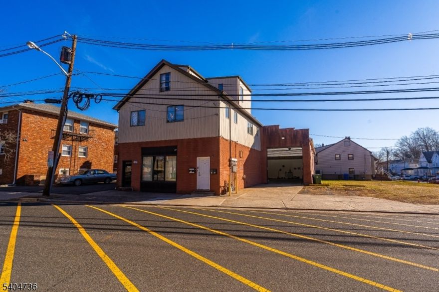 This versatile mixed-use building offers approximately 2,651 sq ft of warehouse space on ground floor complemented by 1,178 sq ft of office space, including a ½ bath, to be renovated to suit tenant needs. The layout provides flexibility for a variety of commercial uses, making it an excellent opportunity for businesses seeking functional space in a highly accessible area.Situated in close proximity to Downtown Linden, the Linden Train Station, Route 1 & 9, NJ Turnpike, Goethals Bridge, and the Garden State Parkway, this property delivers exceptional connectivity for employees, clients, and logistics. The phenomenal location is further enhanced by on-site parking for two vehicles.Tenant is responsible for obtaining zoning approval from the City of Linden, including submission of any required applications and associated costs. An ideal option for businesses looking to customize space in a strategic, high-demand corridor. Building has a camera system with 7 Cameras covering warehouse, office and exterior of building.